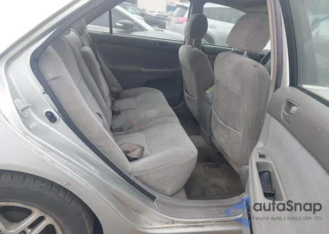 2002 Toyota Camry Le from USA, damaged, VIN JTDBE32K220080561